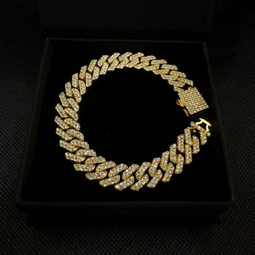 GOLD PRONG LINK BRACELET.
